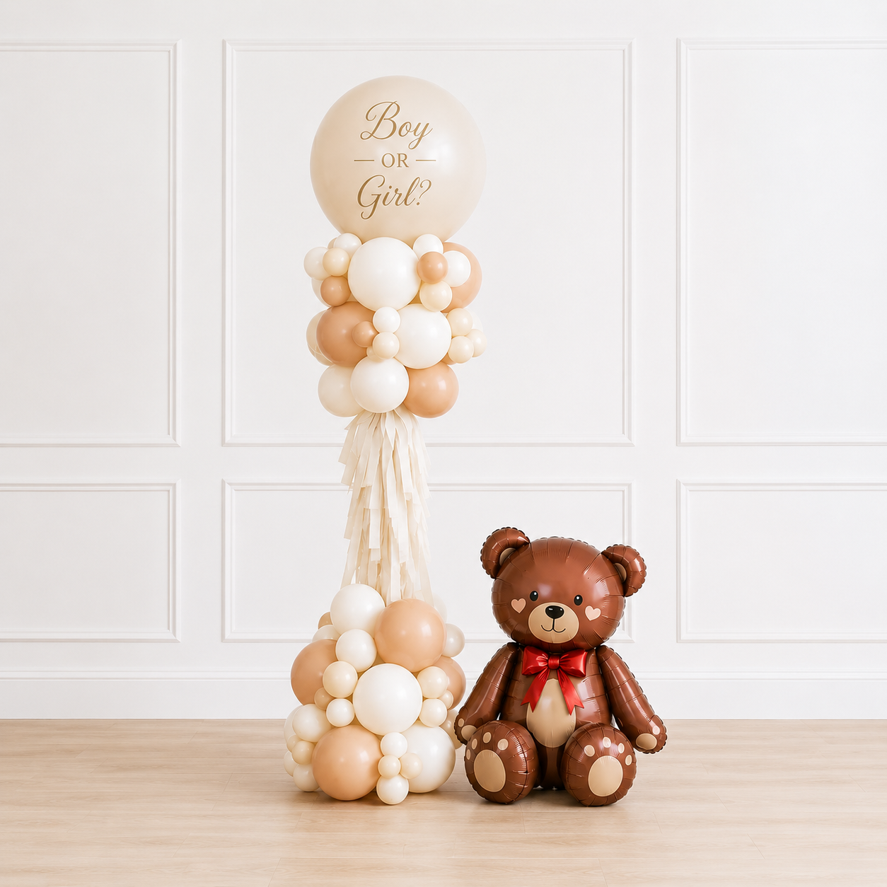 Luxury neutral gender reveal balloon tower with personalized “Boy or Girl?” jumbo balloon, teddy bear balloon, organic balloon styling, and confetti pop reveal by Cedarwood Events.