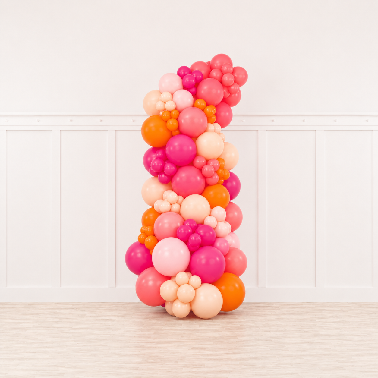 Signature Tropical Sunset™ Grab & Go Balloon Garland featuring watermelon, hot pink, blush, baby pink, and orange balloons by Cedarwood Events. Beverly Hospital Gift. Boston Balloons