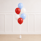 Signature She’s Ready to Pop™ luxury helium balloon bouquet featuring seven 18-inch baby blue, white, and red balloons for a baby shower celebration.