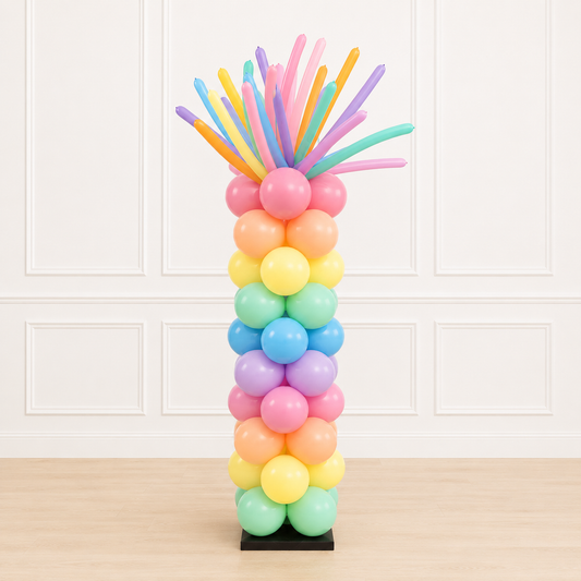 Luxury pastel rainbow balloon palm tree column by Cedarwood Events featuring premium pink, peach, yellow, mint, blue, lavender, and twisting balloons. Perfect for birthdays, baby showers, tropical parties, summer events, school celebrations, and corporate events.